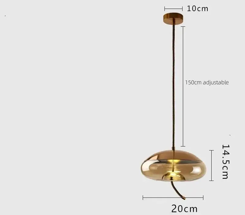A modern brass-finished led chandelier with sleek translucent amber glass led shade and adjustable 150cm cable