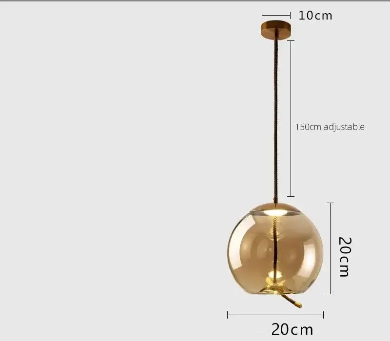 Sleek smoked glass led chandelier with warm amber globe, brass ceiling mount, and adjustable black cord for living room