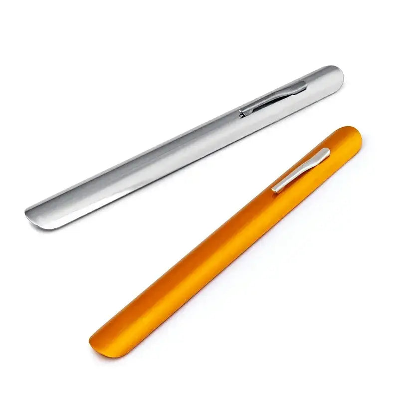 Two sleek stainless steel crumb cleaner cake tools with polished silver and vibrant orange finishes for dining room scraping
