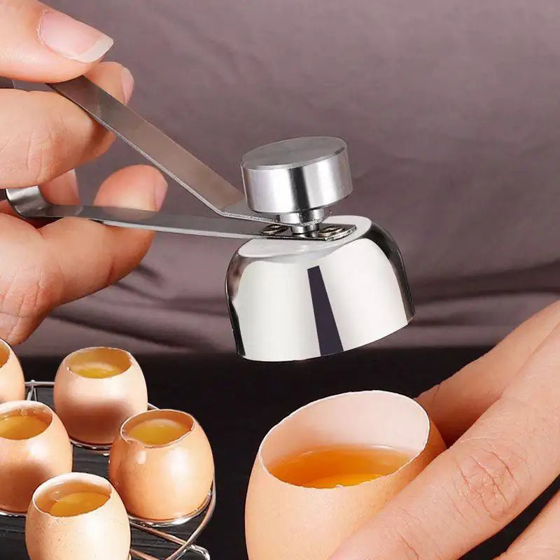 Shiny stainless steel egg separator with sleek curved handle and rounded top in egg topper set kitchen cutter and scissors