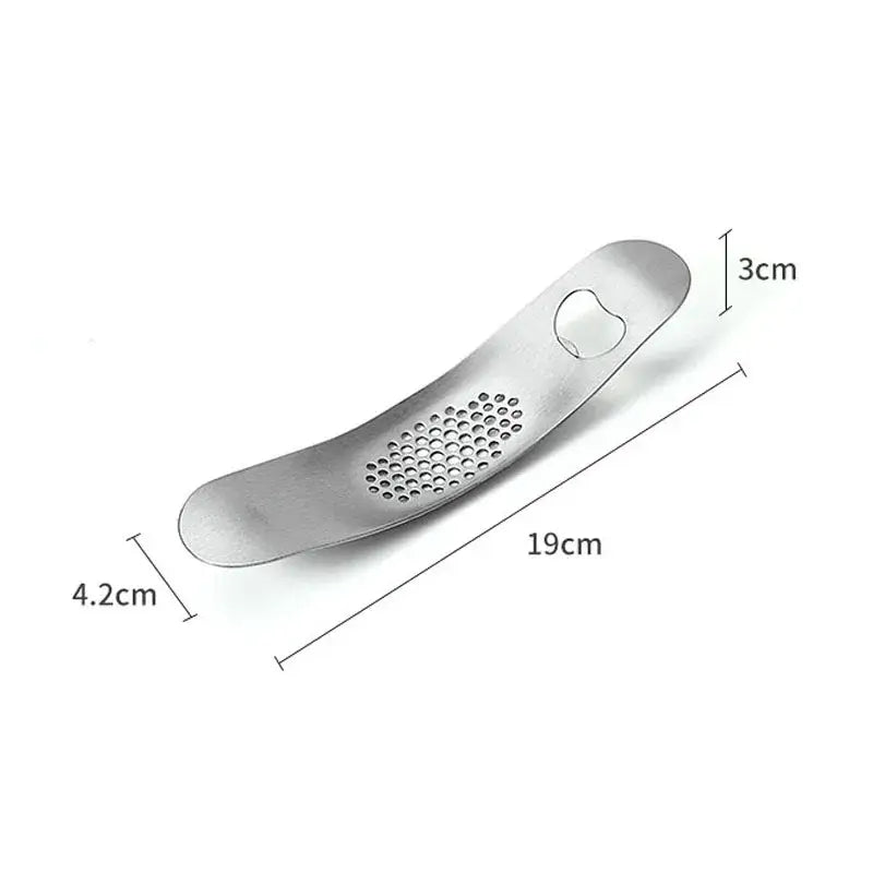 Sleek stainless steel garlic press with built-in bottle opener from decorbites garlic press kitchen tool collection