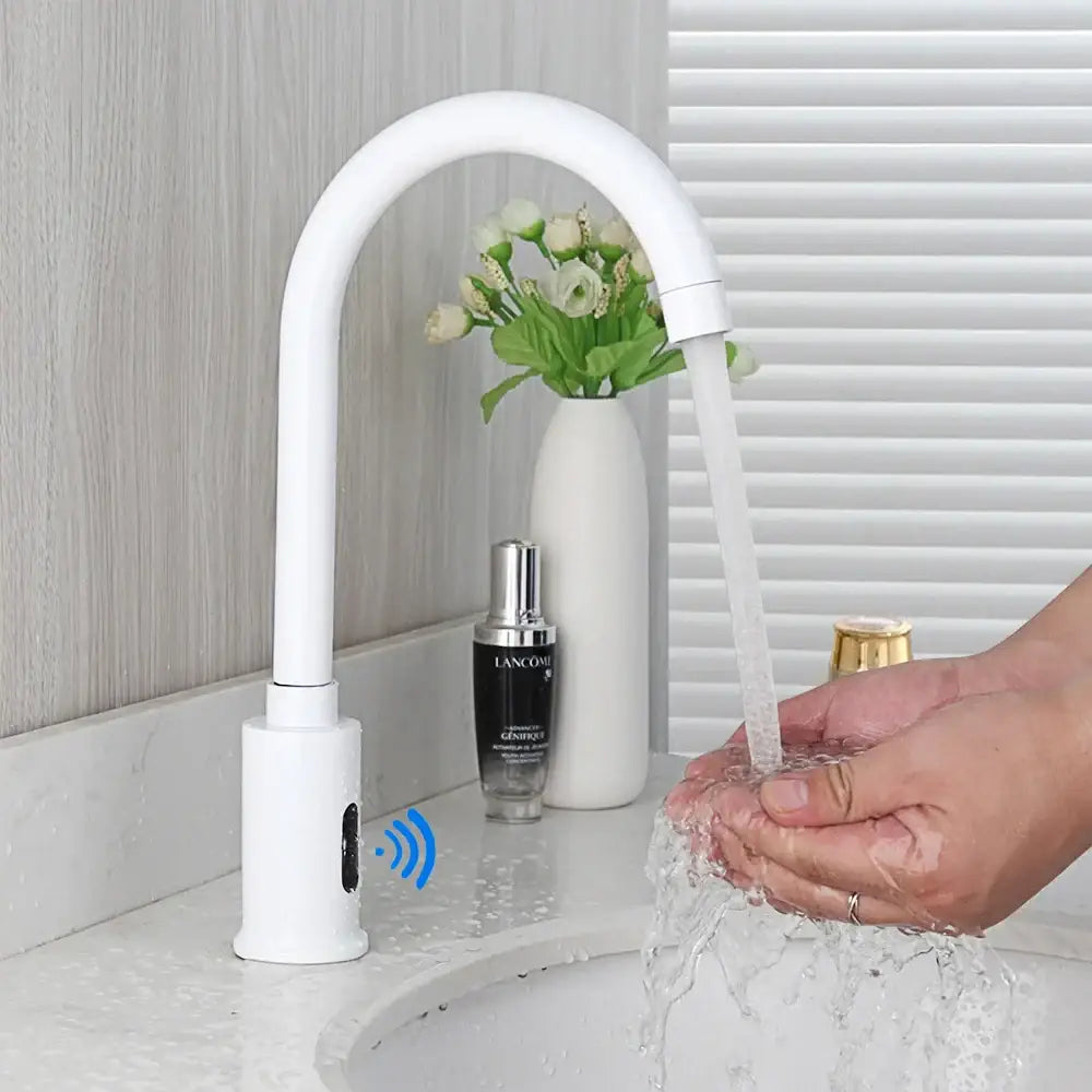 Sleek white automatic sensor bathroom faucet with curved design featuring wireless sensor technology for touchless use