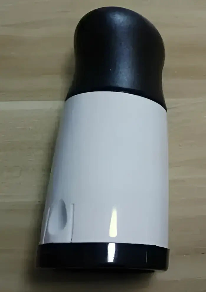 Sleek white and black decorbites herb grinder chopper with glossy finish and textured base for kitchen pasta use