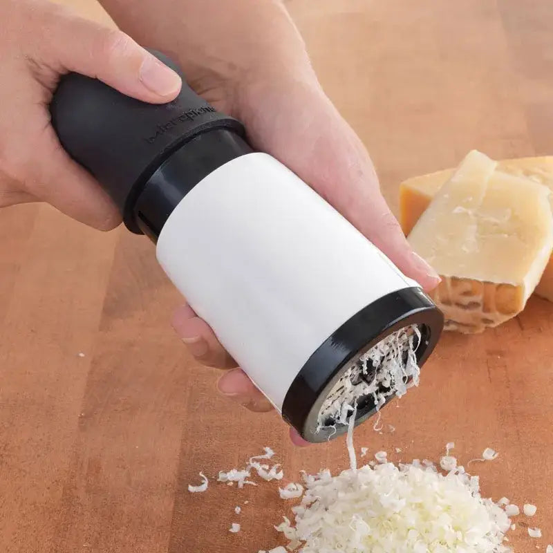 Black and white handheld decorbites herb grinder chopper with sleek cylindrical design for kitchen pasta use