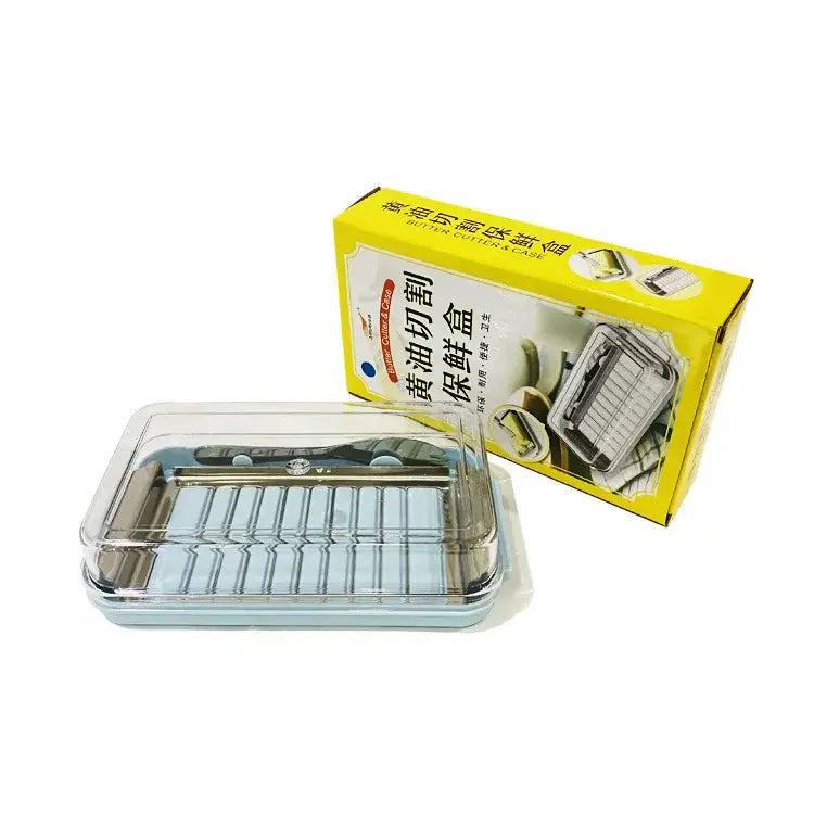 Sleek white and stainless steel decorbites butter slicer with clear plastic lid and silver metal tray in slicer cutter box