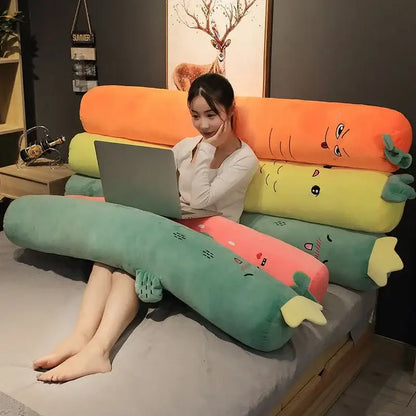 Smiling carrot orange and green cylindrical long pillow with embroidered face and leafy ends for decorbites bedroom decor