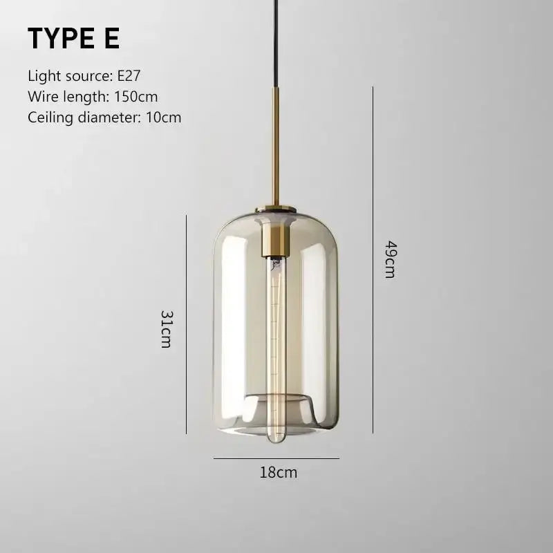 Smoked glass and brass pendant light with cylindrical shade ideal as a modern glass pendant for dining room lighting