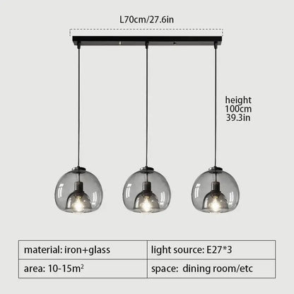 Modern black iron smoked glass pendant lights trio with three spherical glass pendant shades for dining room table