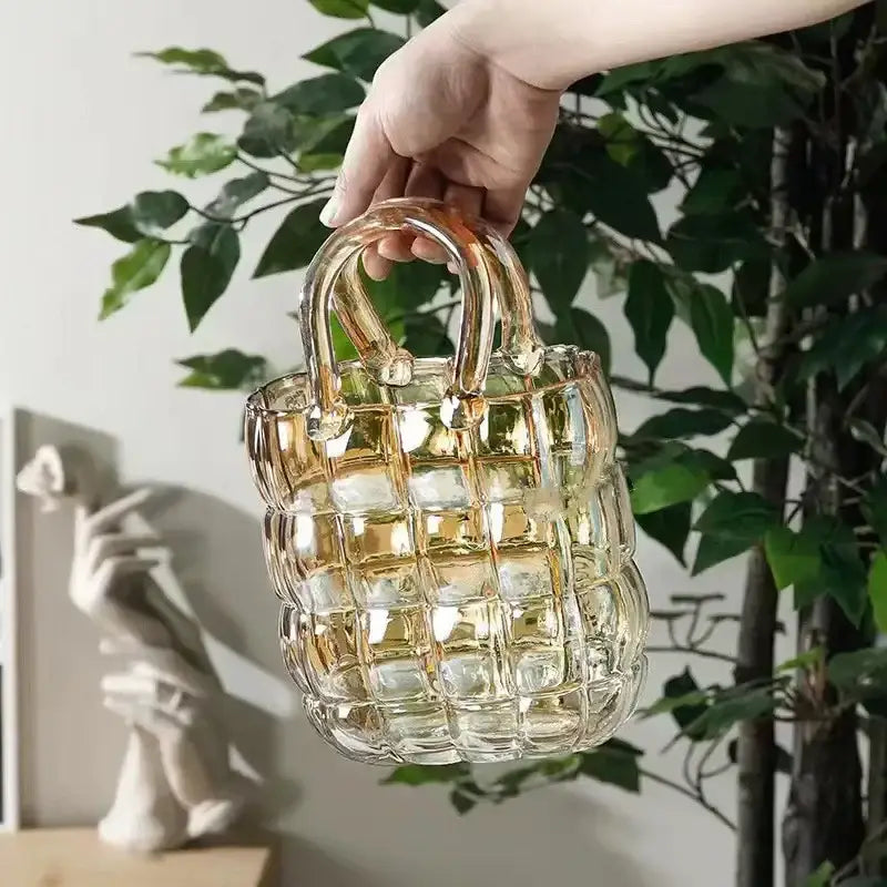 A translucent amber glass handbag with a woven pattern and curved handles for decorbites clear glass decor