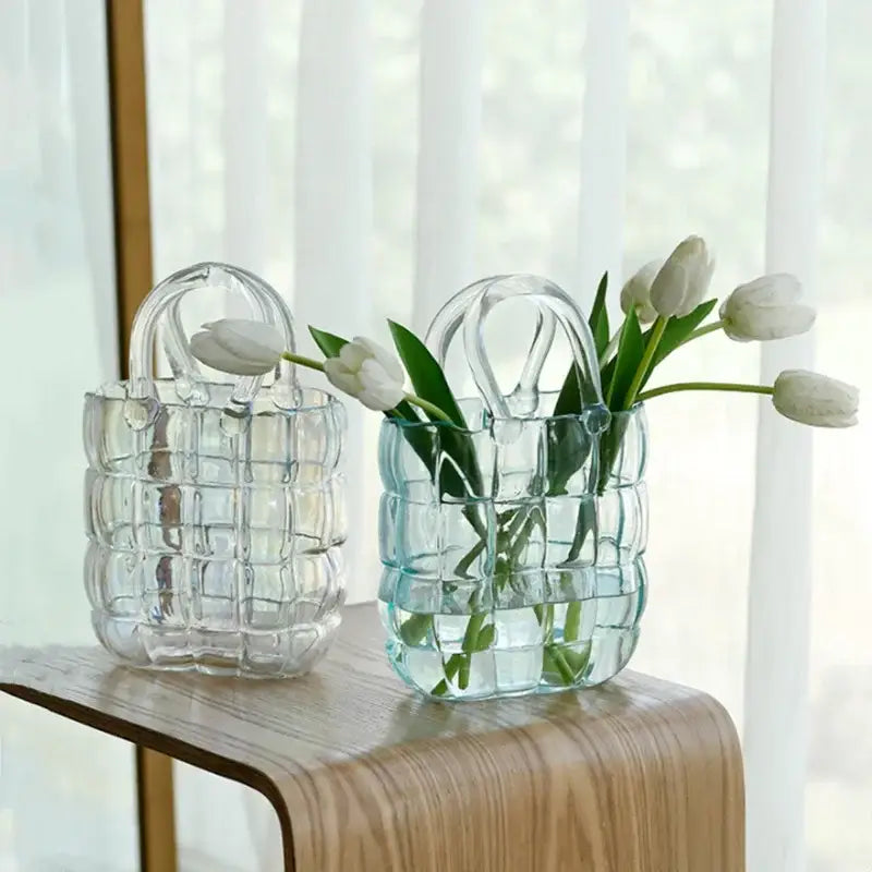 Smoky gray and amber clear glass handbag-shaped vases with quilted texture and loop handles for living room decorbites clear glass decor