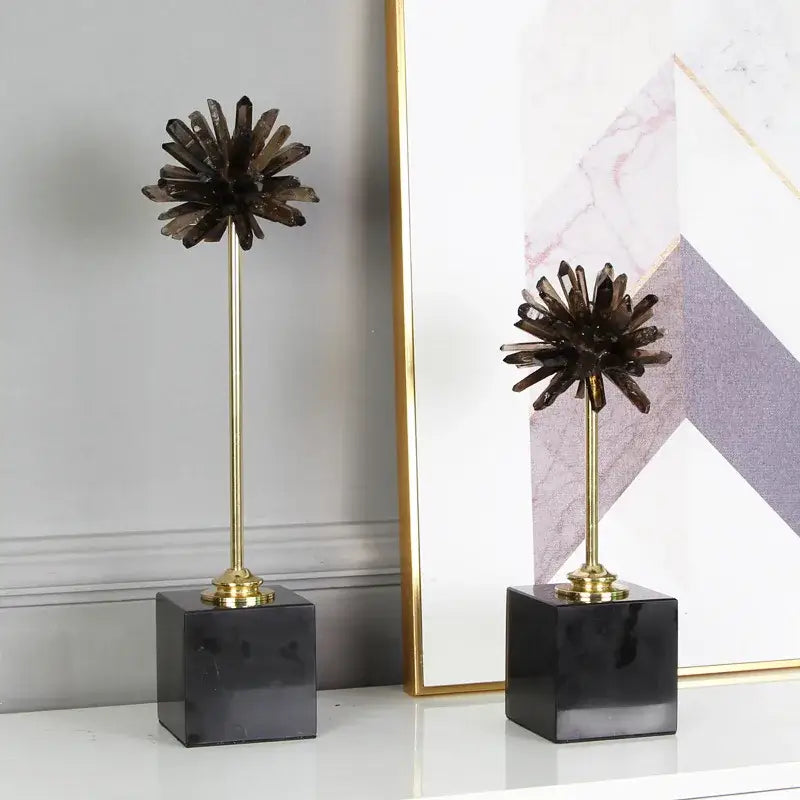 Two dark smoky quartz crystal handicraft artificial flower sculptures on brass stems with black marble bases for home decor