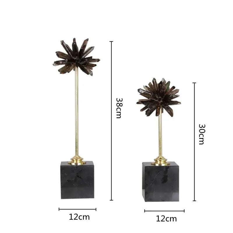 Two dark brown smoky quartz crystal handicraft artificial starburst ornaments on brass stems with black marble bases for home decor