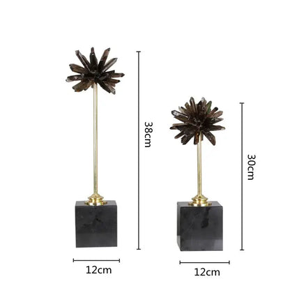 Two dark brown smoky quartz crystal handicraft artificial starburst ornaments on brass stems with black marble bases for home decor