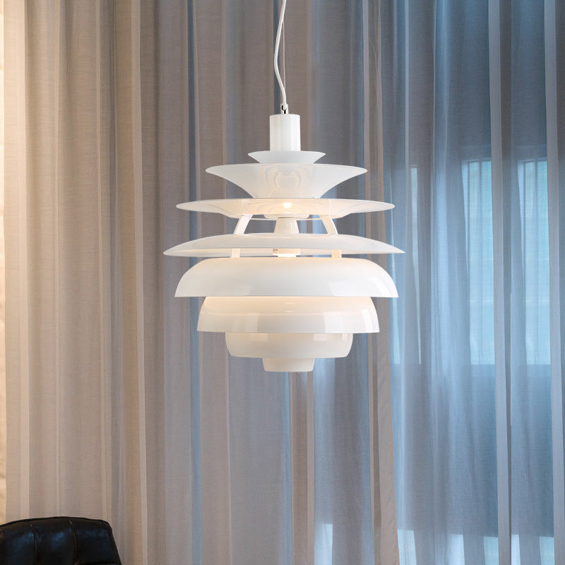 White layered pendant light with a modern design, resembling the ph 5 model by louis poulsen.