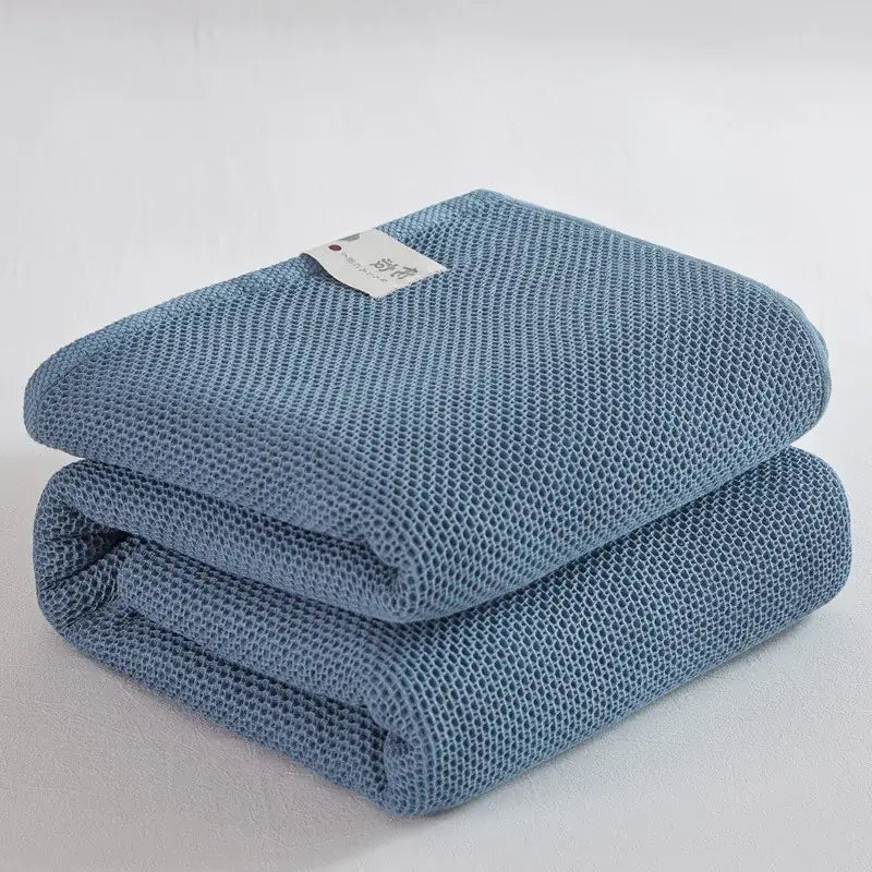 Soft beige cotton honeycomb towel blanket with textured woven pattern ideal for living room couch decorbites cotton honeycomb