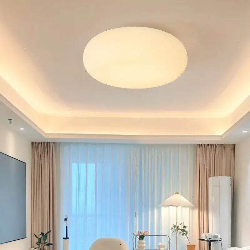A sleek circular decorbites cream apple pendant light with soft white diffuser and warm glow for bedroom decor