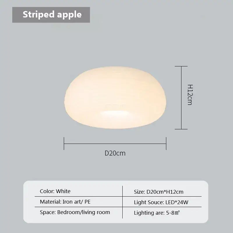 White oval-shaped decorbites cream apple pendant light with a frosted finish and vertical striping for bedroom decor