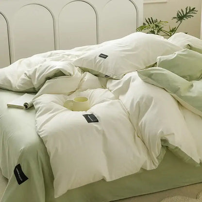 Soft cream cotton bedding set with pale green duvet and subtle texture featuring black decorbites cotton bedding tags