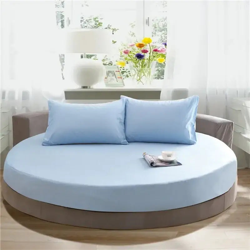 Light blue cotton round bed with matching pillowcases and soft smooth fabric finish by decorbites cotton round set