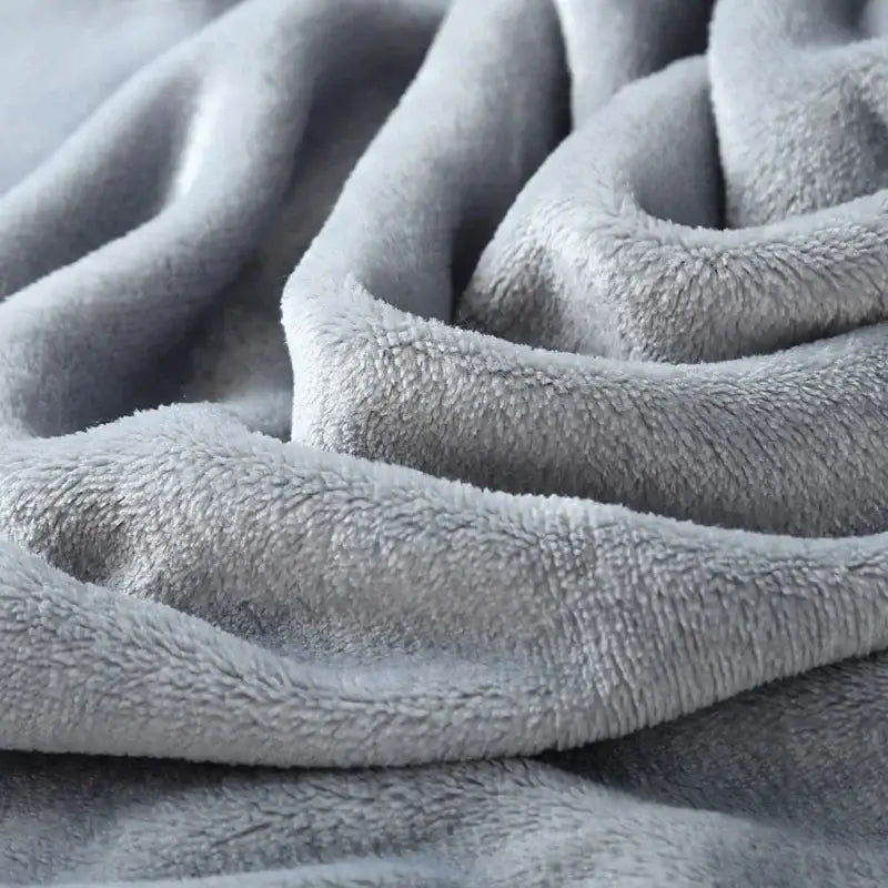 Soft gray plush flannel warm blanket with cozy textured surface perfect for decorbites cozy flannel bedroom use