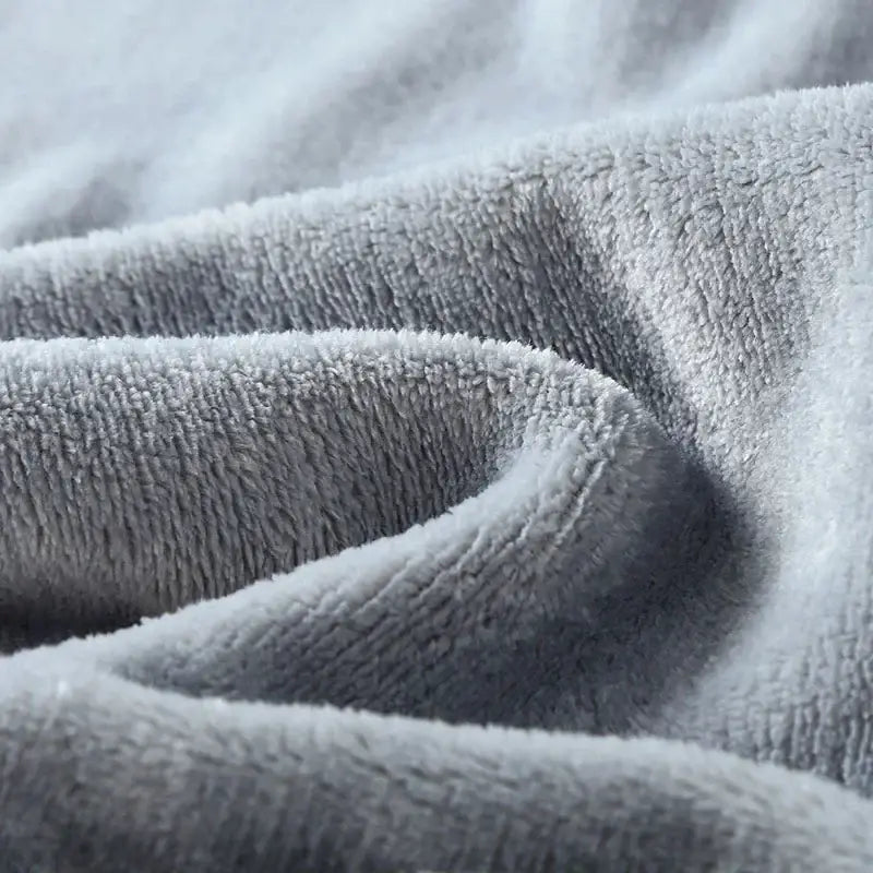 Soft gray plush flannel warm blanket with dense textured surface from decorbites cozy flannel collection