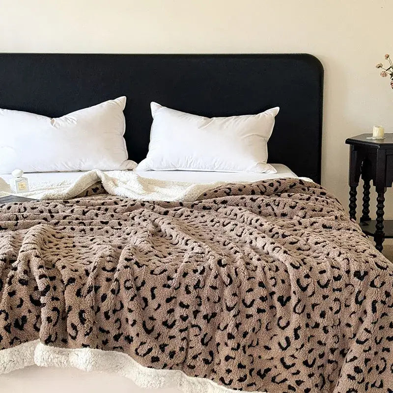 Cozy beige and black soft leopard print double layered wool blanket with plush fleece texture for bedroom decorbites