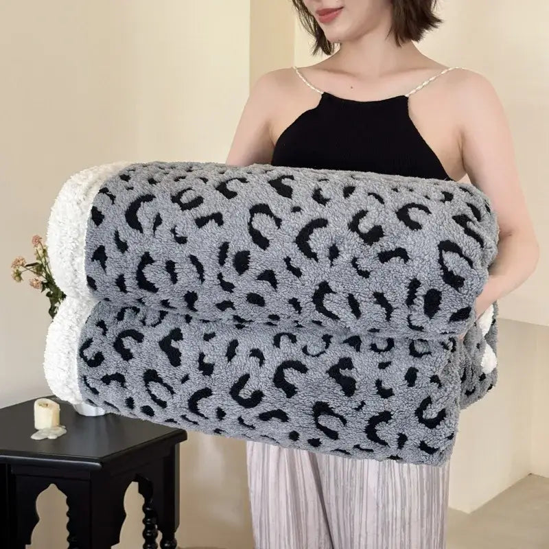 Soft gray and black leopard print double layered fleece blanket with plush texture for bedroom decorbites leopard print throw