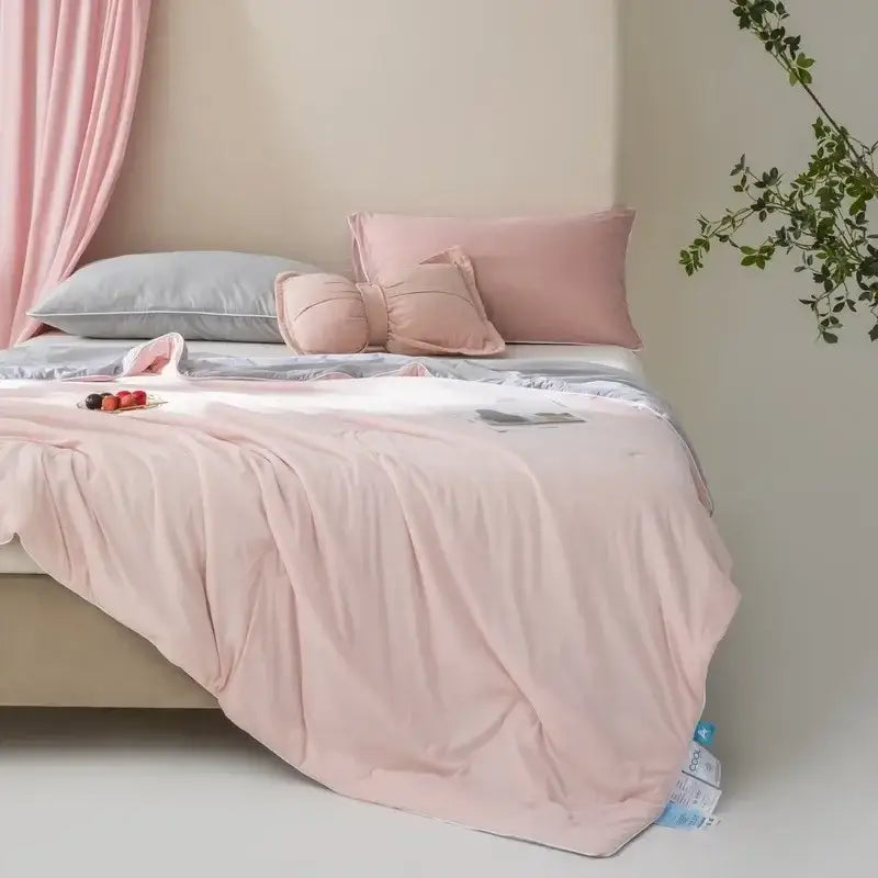 Soft pink duvet cover with subtle sheen draped on bed for decorbites cooling quilt bedroom quilted comforter