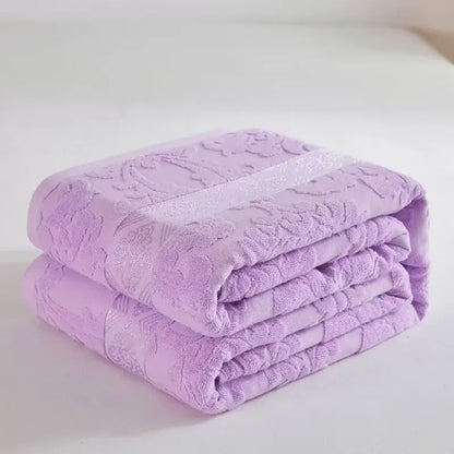 Soft pastel lavender decorbites cotton jacquard towel blanket with raised floral pattern and shimmering stripe for bedroom decor