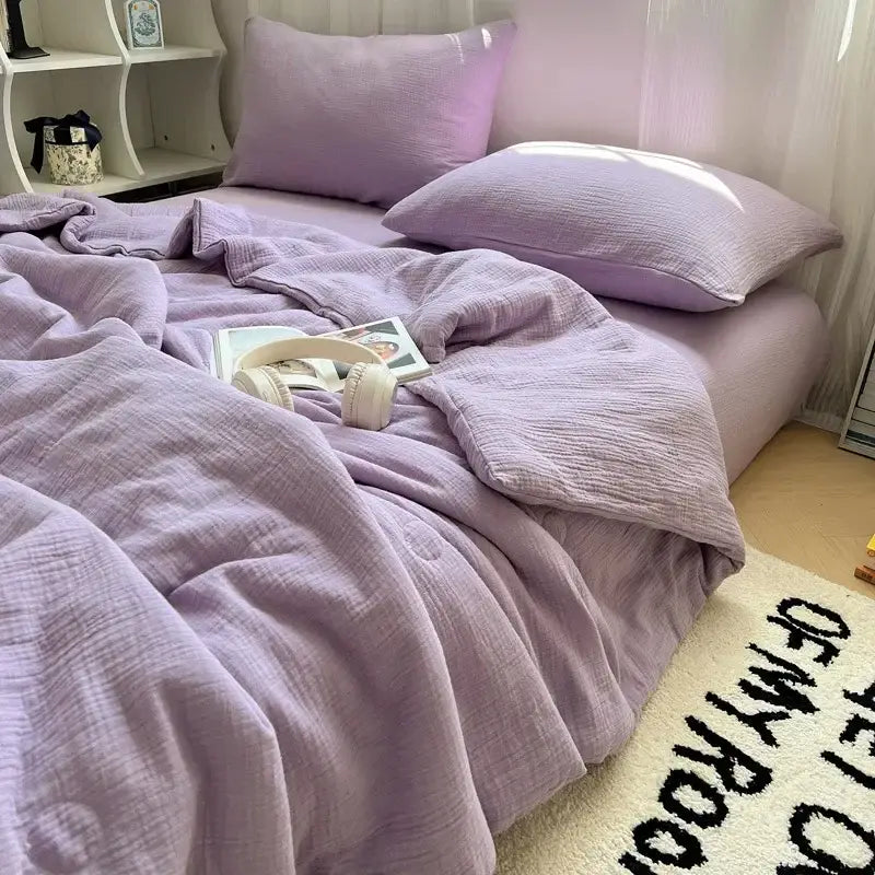 Lavender-colored textured cotton duvet set with matching pillows featuring decorbites cooling wrinkled yarn design