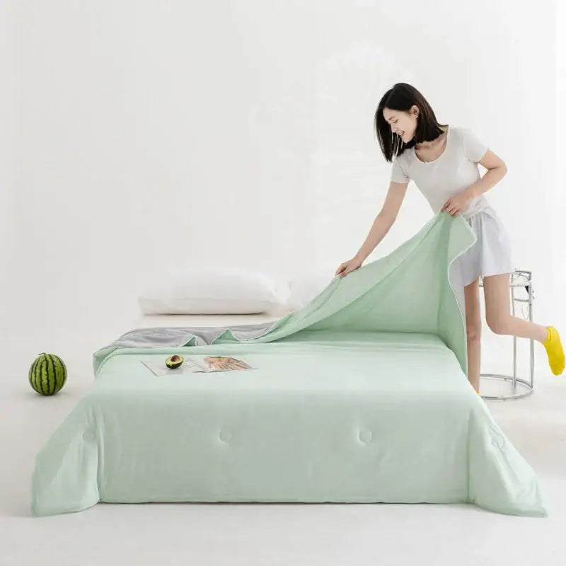 Mint green quilted summer quilt made with decorbites cool fibre ideal for cool fibre summer bedroom decor