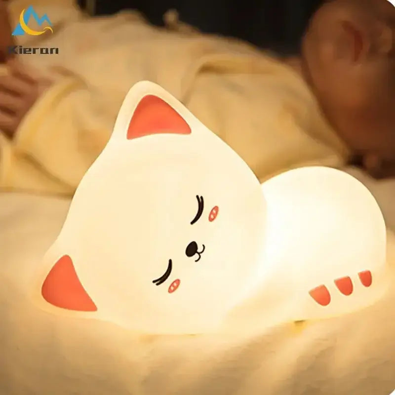 Soft white silicone cat led night light with glowing orange ears and paw pads ideal for bedroom decorbites cat led decor