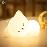 Soft white cat led night light made of silicone with closed eyes and tiny nose for bedroom decorbites cat led decor