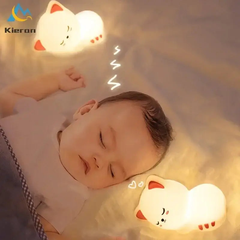 Soft white cat led night light with red silicone details softly glowing above a sleeping baby for bedroom decorbites cat led use