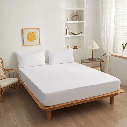 Soft yellow and beige decorbites cotton fitted sheet with smooth stretchy fabric snugly covering mattress