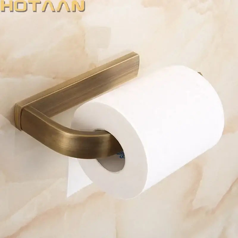Antique brass finish toilet paper holder with a sleek modern design for bathroom accessory use