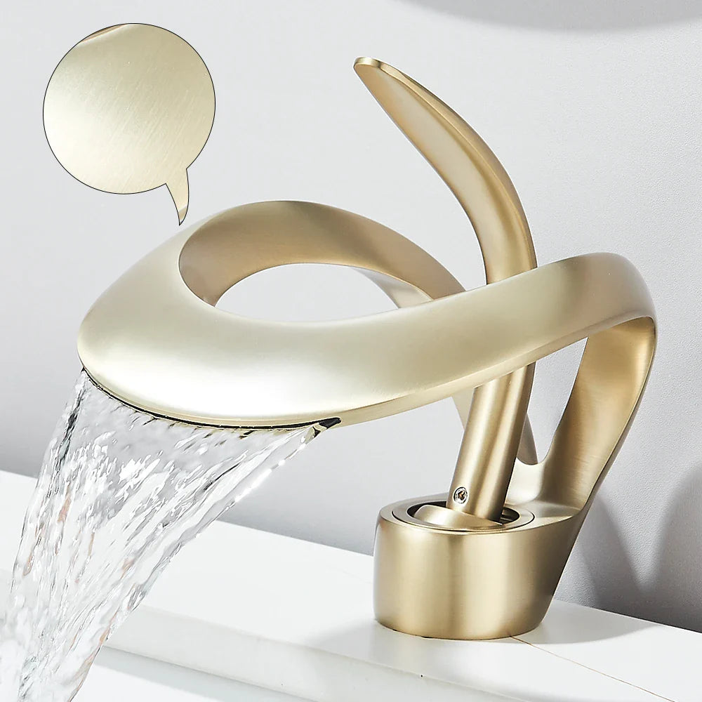 Gold-toned solid brass single hole waterfall basin faucet with sleek modern design for cold water bathroom sink use