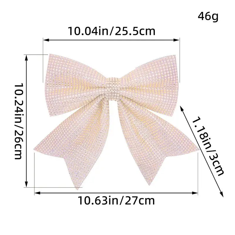 Delicate blush pink diamond bow pendant with sparkling mesh-like crystals for holiday tree decor in living room