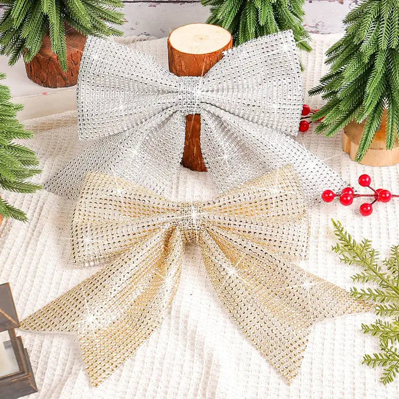 Shiny silver and gold rhinestone-embellished diamond bow pendant for holiday tree decor in living room
