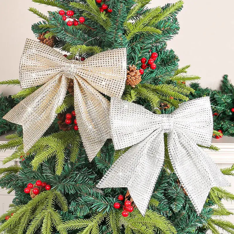 Sparkling gold and white diamond bow pendant made of textured mesh with sparkling embellishments for holiday decor