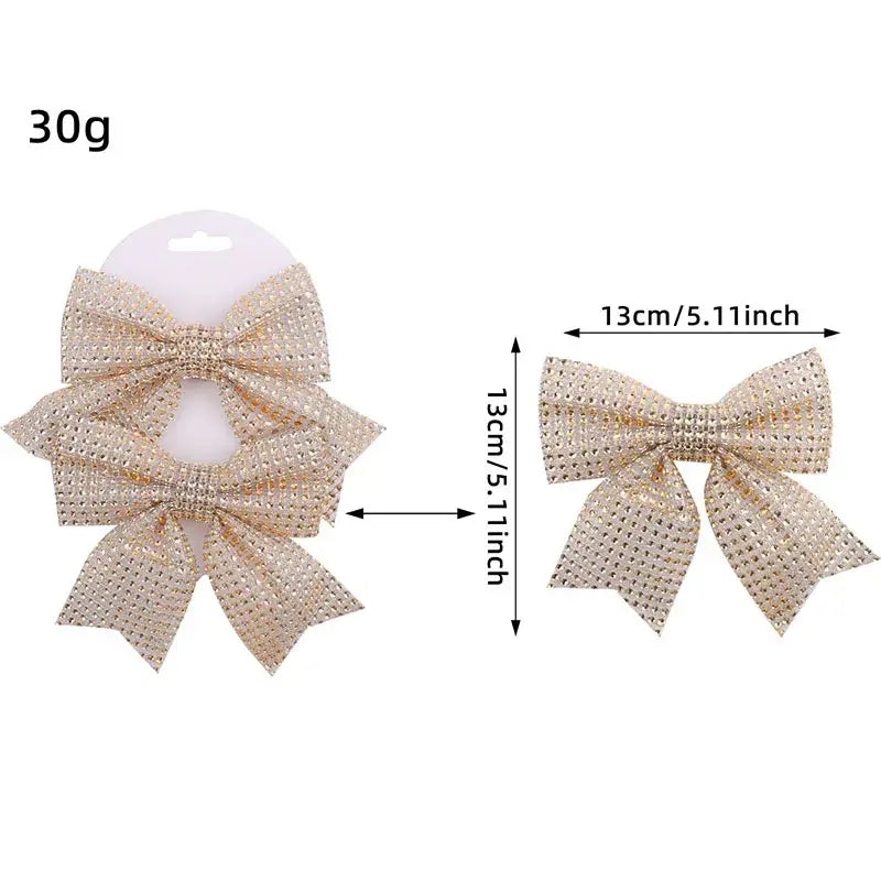 Gold rhinestone-embellished bow pendant with diamond bow design for holiday tree decor in living room