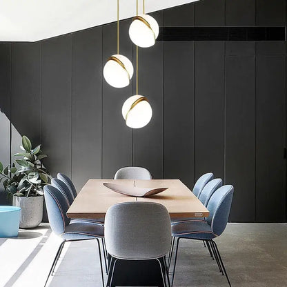 Modern pendant lights with spherical white glass shades and gold lustre led metal accents for living room decorbites gold lustre