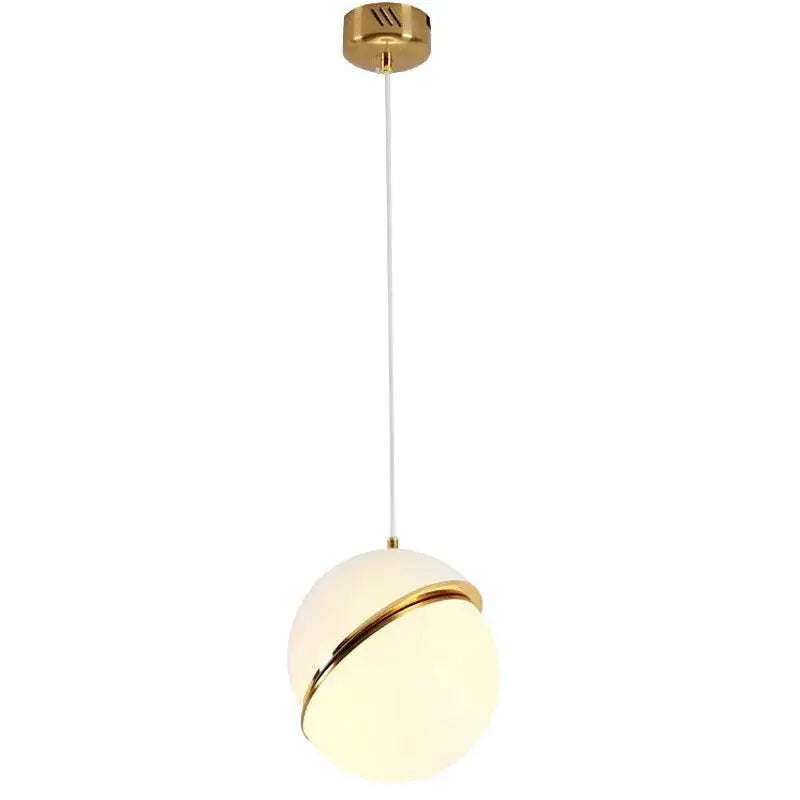 A modern spherical pendant light with gold lustre led opal glass globe and decorbites gold lustre metal frame for living room decor