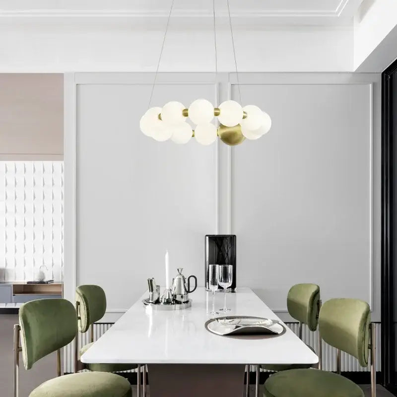 Spiral brass led chandelier with frosted acrylic globe bulbs and brushed brass fixture for dining room decorbites brass led