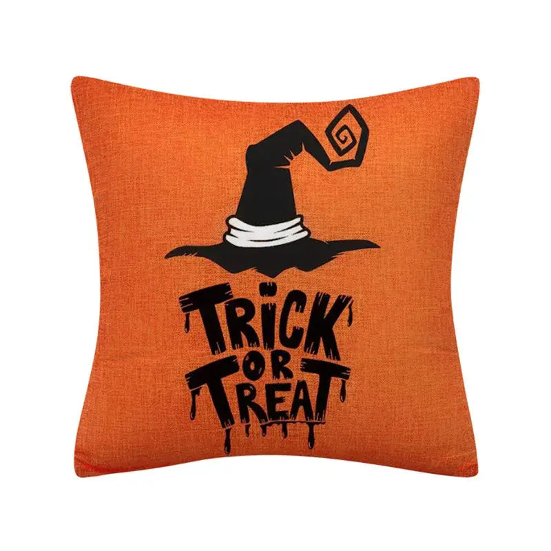 Orange halloween pumpkin linen cushion cover featuring a black witch hat and trick or treat text for living room sofa