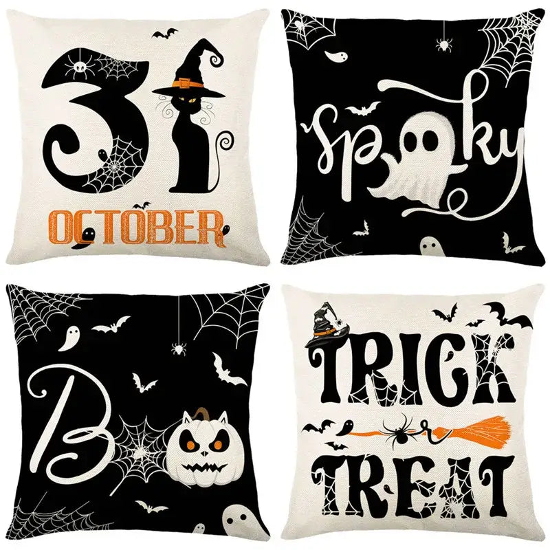 Set of four halloween pumpkin linen cushion covers with black white spooky designs and orange accents for sofa