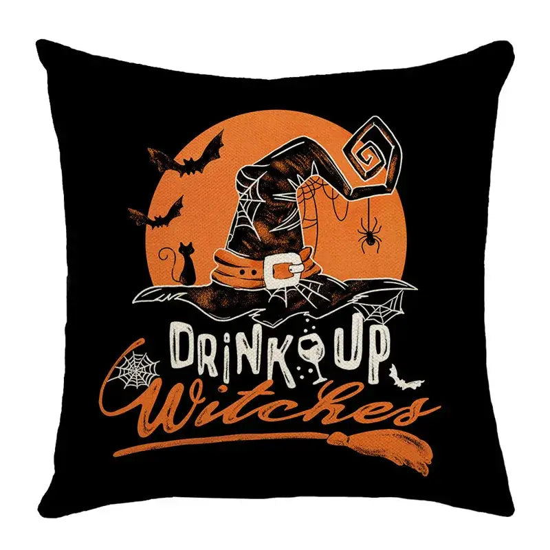 Black halloween pumpkin linen throw pillow featuring a witch hat bats and drink up witches text for living room sofa
