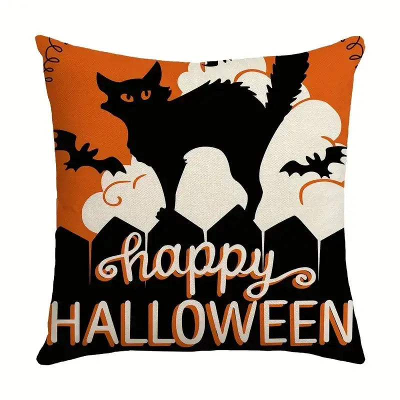 Orange and black halloween pumpkin linen cushion featuring cat silhouette bats ghostly houses and happy halloween text