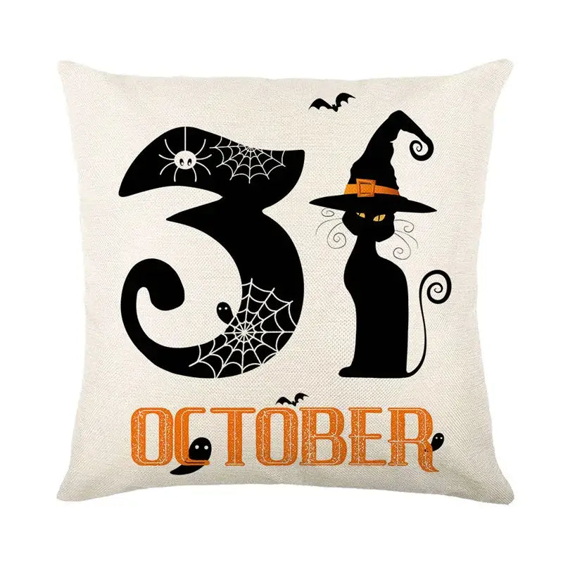 Off-white halloween pumpkin linen cushion cover with black witch cat number 31 spiderwebs and orange october lettering