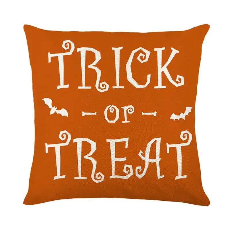 Orange halloween pumpkin linen cushion cover with white trick or treat text and bat designs for living room sofa